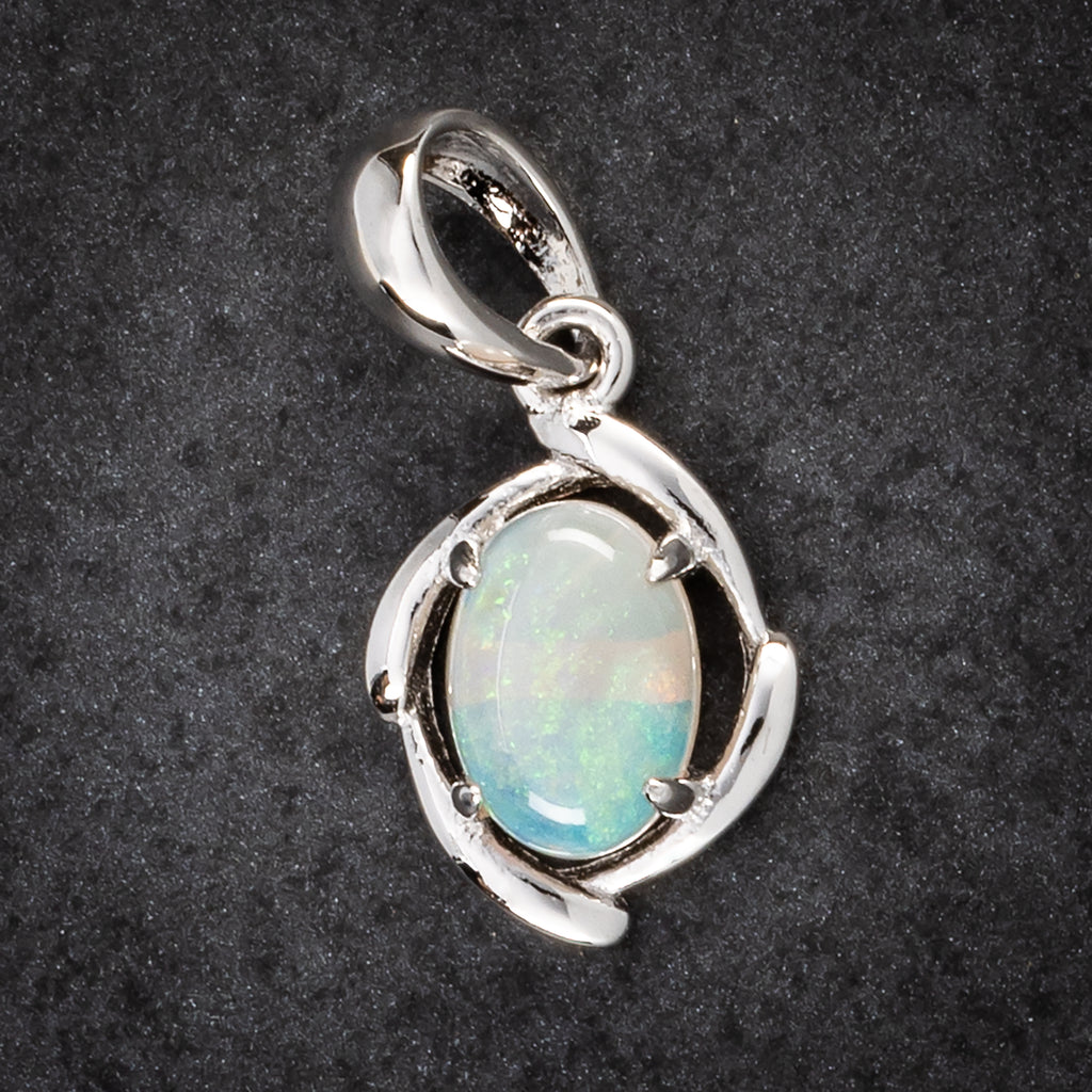 silver solid pendant with blue and white opal 