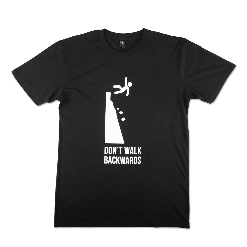 black t shirt with stick figure falling off cliff with words reading dont walk backwards 