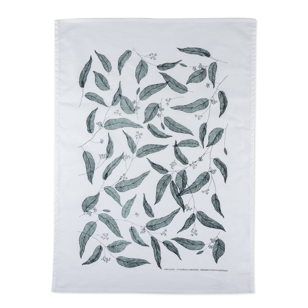 white tea towel with green eucalyptus leaves 