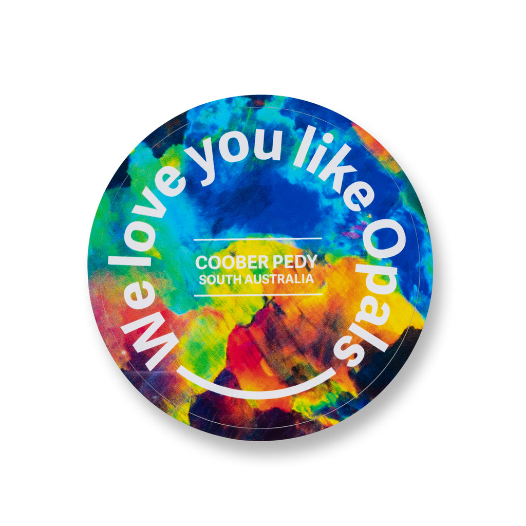 round rainbow sticker reading we love you like opals 