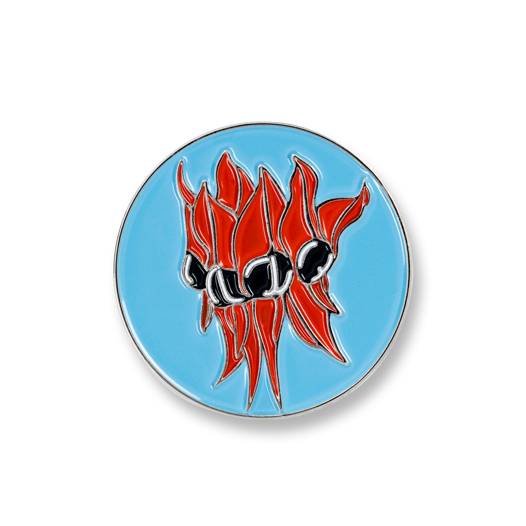 round blue and red lapel pin with picture of sturt desert pea 
