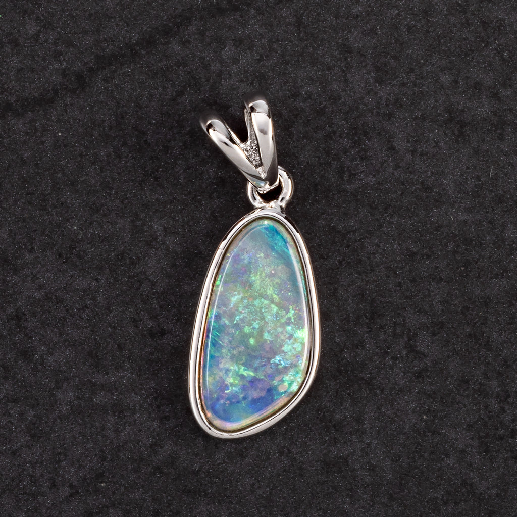 silver solid pendant with blue opal 