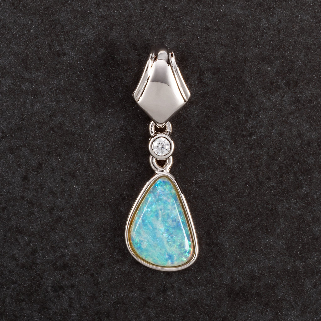 dangling solid silver pendant with blue opal 